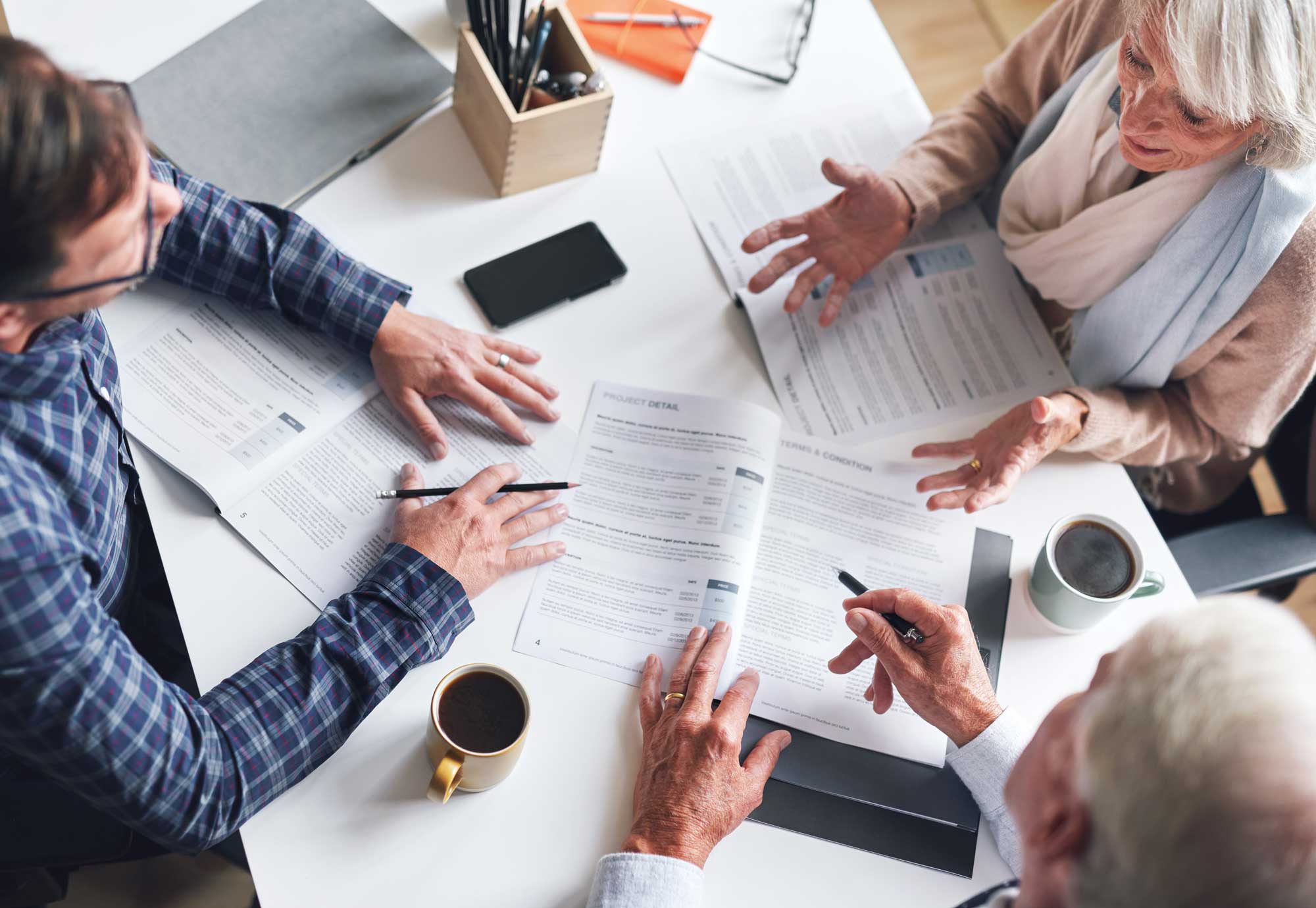a-senior-couple-meeting-their-advisors-to-discuss-and-plan-their-retirement
